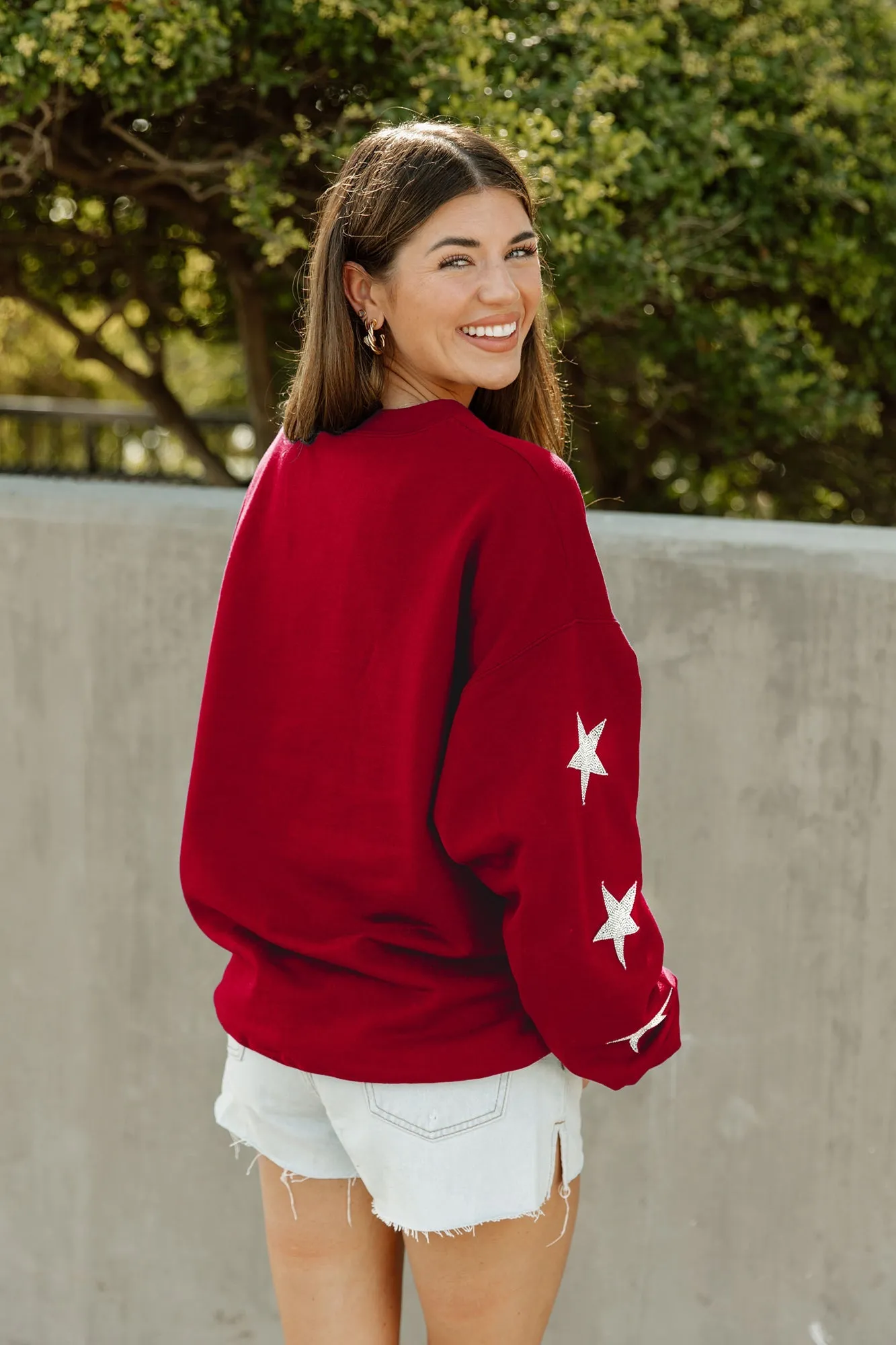 ARKANSAS RAZORBACKS WINNING TEAM EMBELLISHED SLEEVE CREWNECK PULLOVER BY MADI PREWETT TROUTT