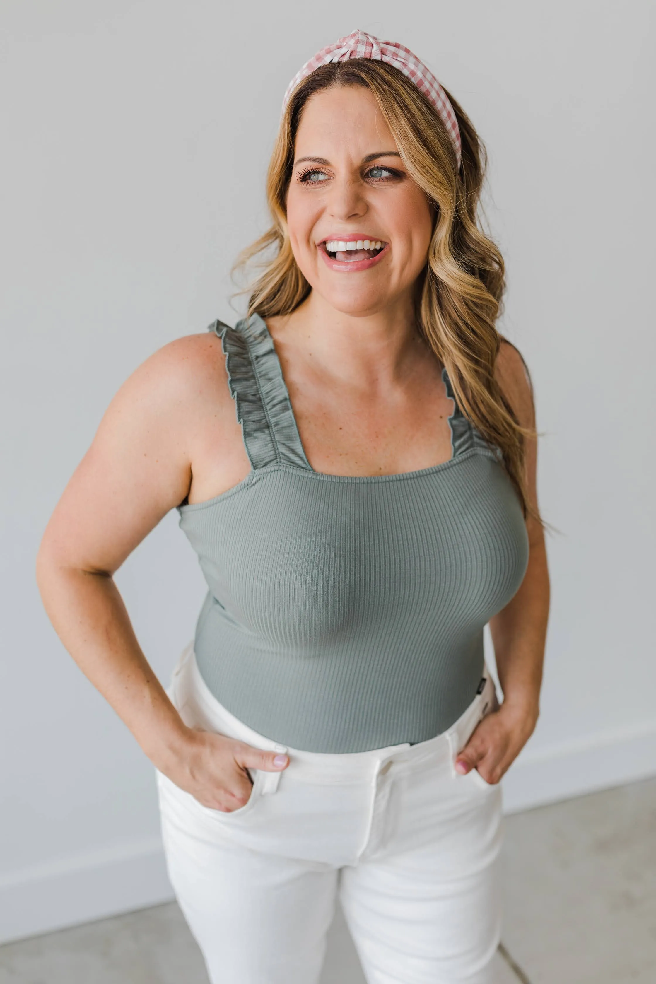 The Ellie Sleeveless Ruffled Strap Bodysuit